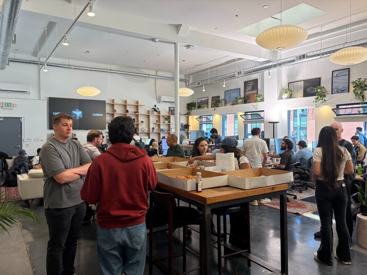 Networking at Cafe Cursor. Photo by EO.