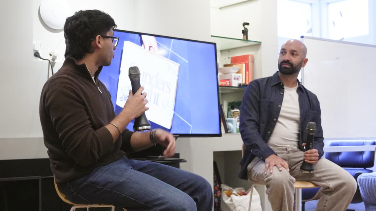 Andrew D'Souza (right) and Ayush Gupta on the panel. Photo by EO.