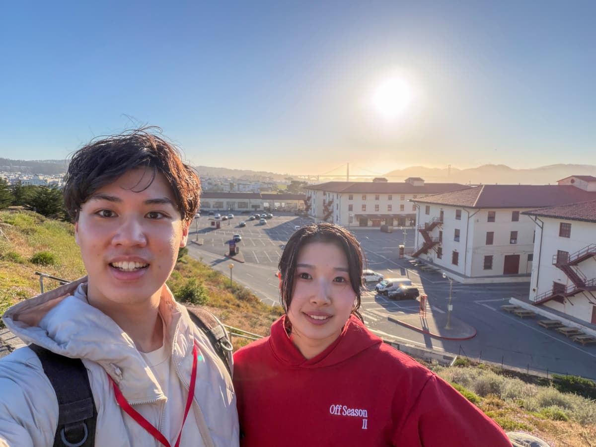 Hina and Taro at Fort Mason, with the Golden Gate Bridge behind them. Courtesy of Arkor.