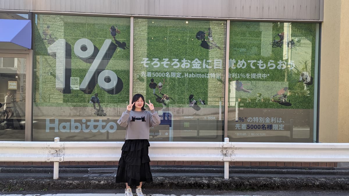 Hina in front of Habitto's office. Courtesy of Arkor.