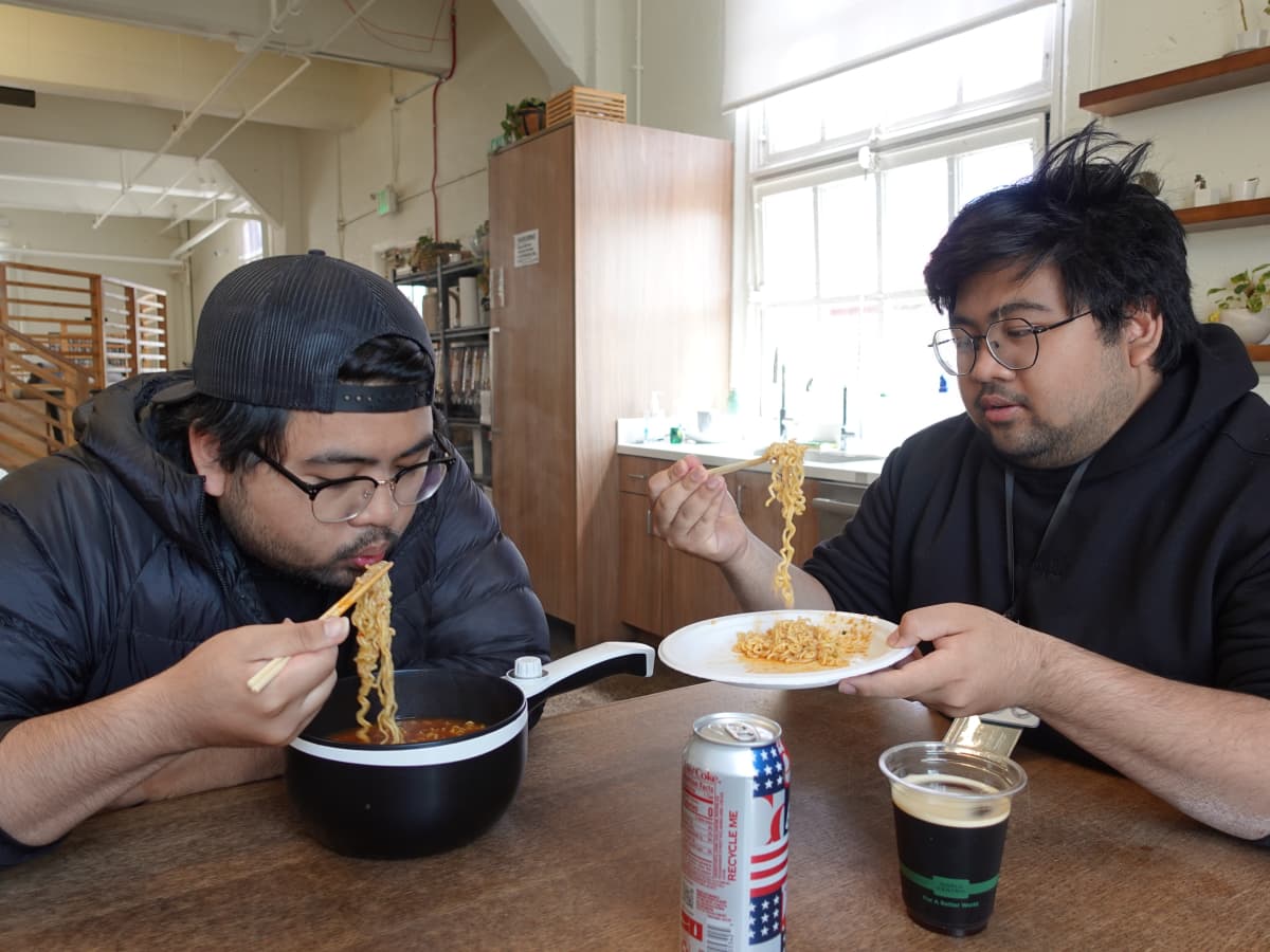 Dale and Dalton sharing a pot of ramen in the Founders, Inc. kitchen. To save money, they live on ramen and Safeway's Friday deals. Photo by EO.